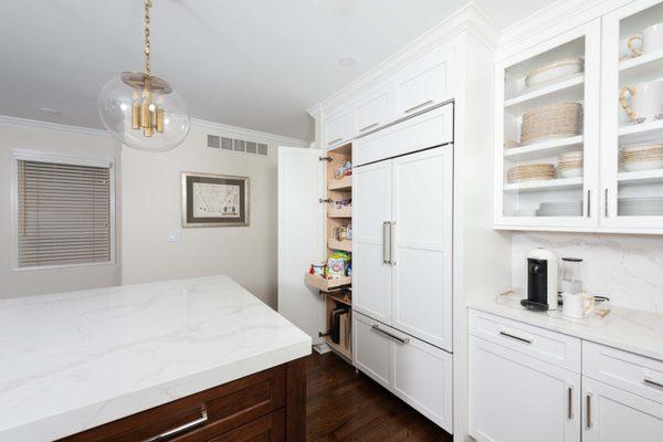 Beautiful Roscoe Village custom pantry pullouts and tray divider section.