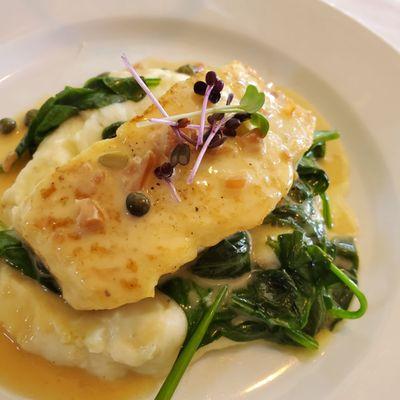 Halibut, whipped potatoes, wilted spinach, beurre blanc and caper sauce. Amazing. Glass of chilled Reisling. Sauce perfect. Delightful.