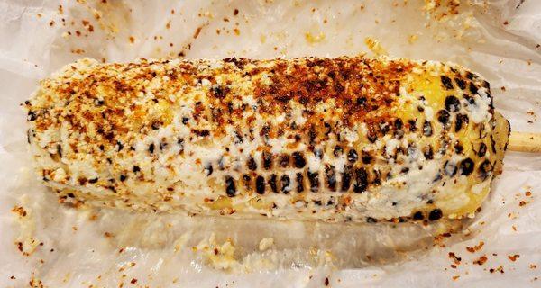 Elote: Grilled corn with mayo cheese and chili ($4)