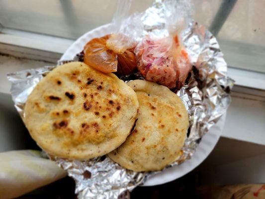 Bean and Cheese & Chicharron pupusas. Salsa and cabbage slaw.