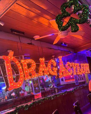 Drag Asylum sign in downstairs bar area