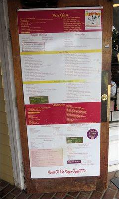 The complete menu is posted on the door, outside of the restaurant, looking out to Washington Street.