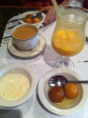 Gulab Jamun, chai tea, mango lassi, and rice pudding