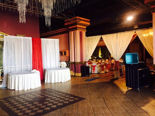 Pipe and drape for a cake and gift and entrance to the hall.