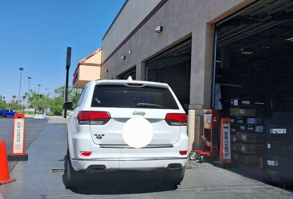 Tire check drive up service area.   Drive up,  wait your turn,  they check the tires' air pressures.