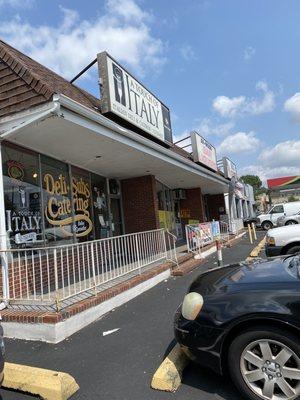 Front view of the deli. It's on the corner of the strip of shops right next to the Delta gas station.