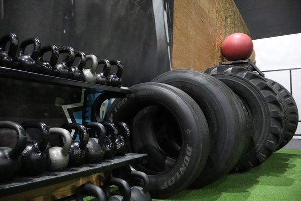 Multiple weighted tires for your flipping and sledgehammering! Did we mention all the kettlebells?!?