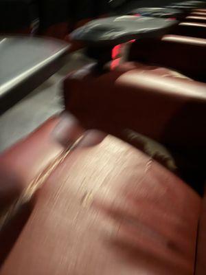 Landmark seats worn and peeling on fake leather recliners