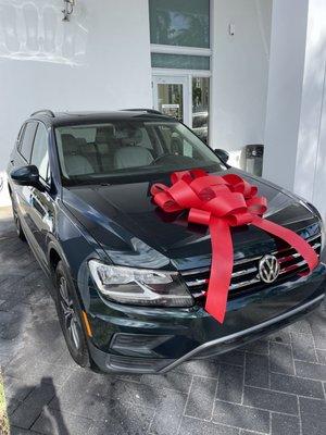 Certified Pre-owned 2019 VW Tiguan in Hunter Green with 15K miles.