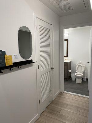 Hallway with washer and dryer