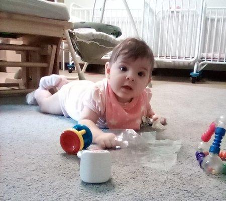 So much to see!  Tummy-time helps us develop important muscles and explore our world.