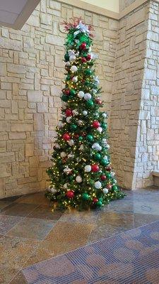 Christmas Tree by Fireplace in dining area