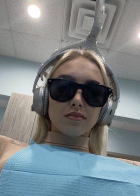 Dental office provided Bluetooth headphones and glasses