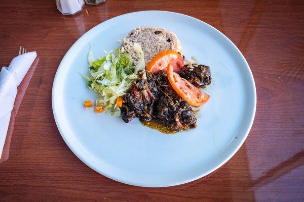 Oxtail with rice and Peas