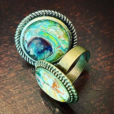 Super cool resin rings are found in the lower level vendor market.