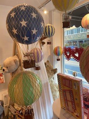 Check out the whimsy balloons in our front windows!