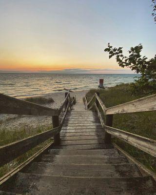 Our beach is accessible by 3 pathways, covered with forest canopy, and lead to overlooks of the Lake!