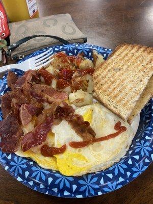 Egg, bacon, potatoes, rye bread