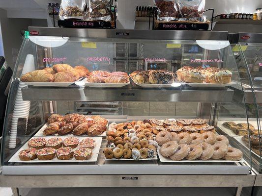 Daily assortment of donuts and croissants