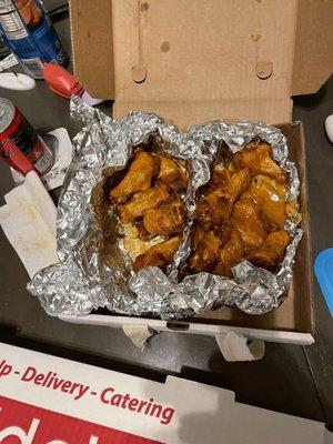 Wings, "mild" on the left and honey mustard on the right. Honey mustard drowned in sauce. "Mild" appear naked and tasted lacking flavor.