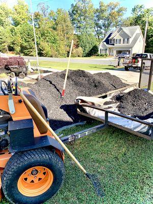 Tiger Cut Lawn Co offers a variety of services, including mulch spreading and landscaping.