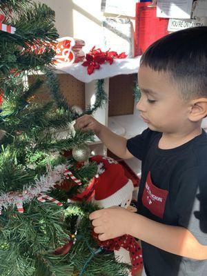 Santa's little helpers decorated our school Christmas tree!