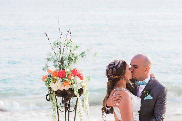 bride and groom kissing