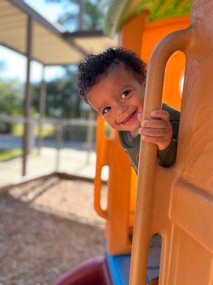 Peek-a-boo!  Fresh air and a climber make for loads of fun!