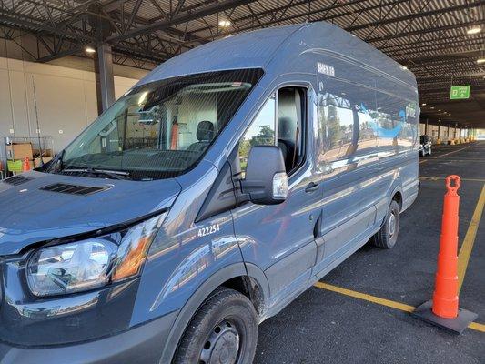 Changing a windshield on an Amazon van