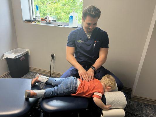 Dr. Kern working with a pediatric patient.