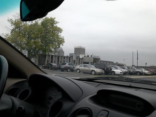 Cars parked at RMV. I tried to take a picture of the huge line outside the building. But my camera missed the shot.