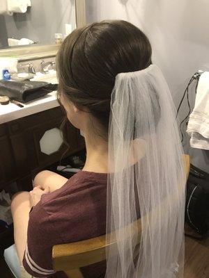 Hairdo with veil for wedding