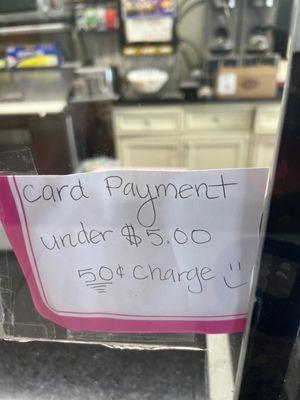 It clearly says the extra credit card charge for payments under $5.00.