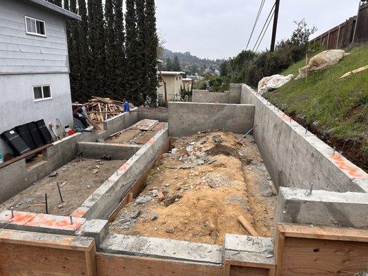 1150 sq ft ADU  duplex hill side  Stem walls are done.   La mesa