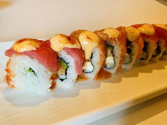 Mushu Roll - Spicy Shrimp, Cream Cheese, Avocado, Salmon, Tuna, jalapeños, spicy Mayo, and sweet chili sauce