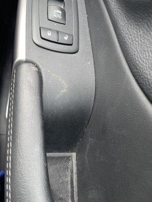 Crumbs and dirt on passenger door