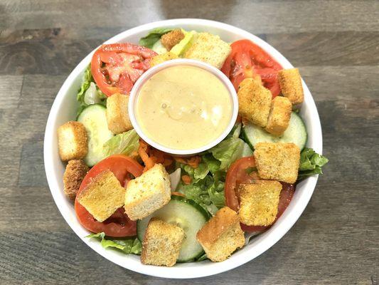 Yummy side salad big enough for two to share.