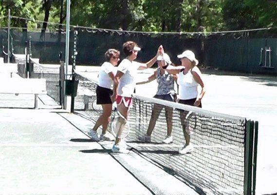 Girls high five at the net!