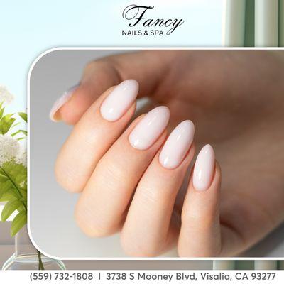 Experience timeless beauty with our sophisticated oval nail designs! Visit Fancy Nails Salon for a touch of refinement.