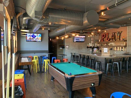 Upstairs bar with free pool and shuffleboard.