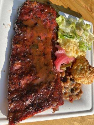 Half rack of ribs with two sides.