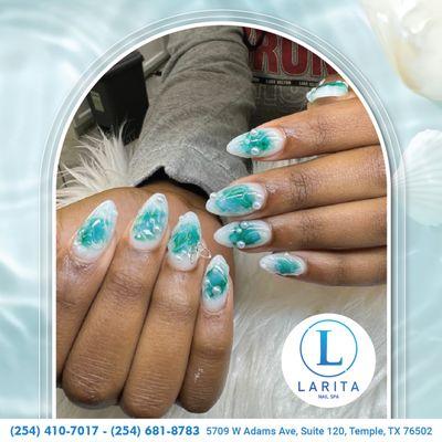 If you are a fan of nail art but still like to stay trendy and simple, try placing designs on your nails for a chic and minimalist look.