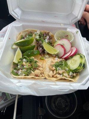 Chicken and Barbacoa tacos. Comes with the sides and is delicious!