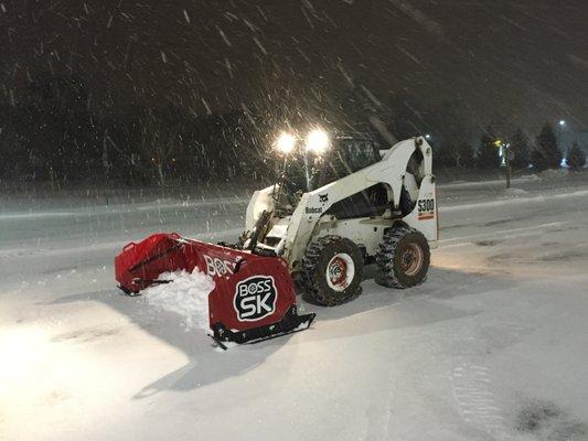 Our bobcat out cleaning up snow