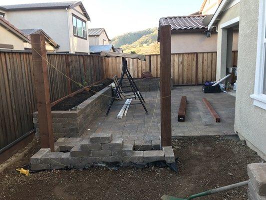 Pavers, planter / seat wall, & fountain