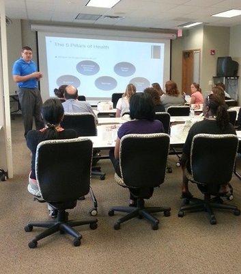 Dr. Kepler giving a health presentation at a local business.