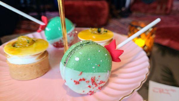 Zee sweets~~~  Cactus macaron lollipop and desert sunset yuzu tart!  Both were yummy and the sweetness  was just riiight!