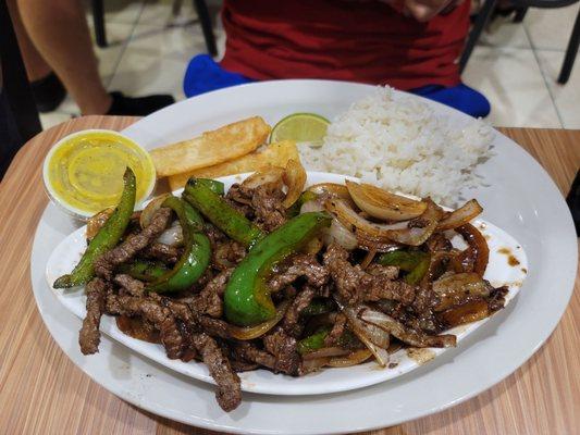 Pepper steak with rice and fried yuca. Delish!