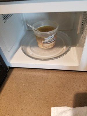 Soup from previous occupant left in microwave