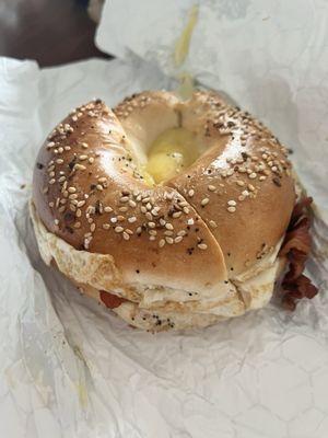 Egg, Meat and Cheese - bacon on an everything bagel